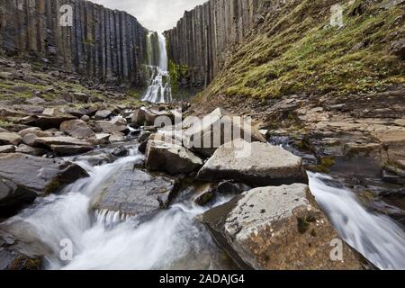 waterfall with basalt columns, near Studlagil, East Iceland, Iceland Stock Photo