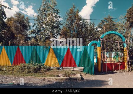 Color painted corrugated iron fence, Ethiopia Stock Photo