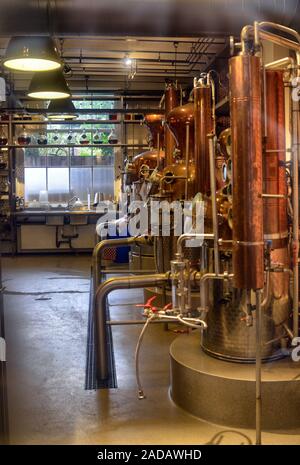 Amsterdam, Holland, August 201. In the central red light district a craft brewery: from the street you can see all the equipment to produce the delici Stock Photo