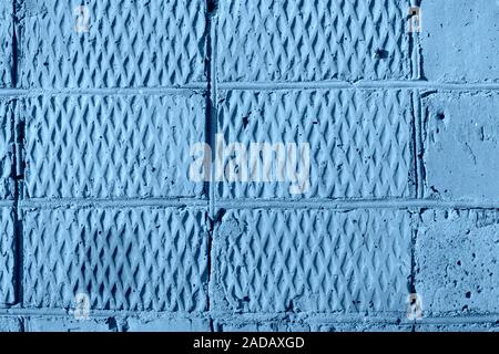 Old brick texture close up. Abstract architectural background blue color toned Stock Photo