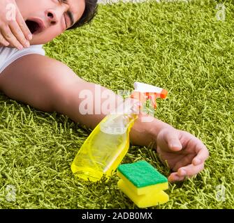 Young husband man cleaning floor at home Stock Photo
