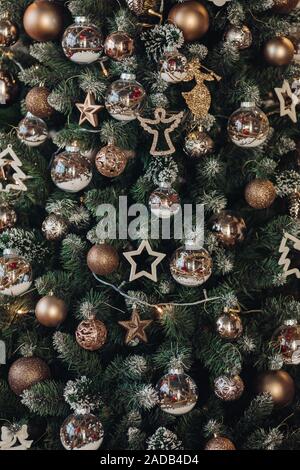 Christmas tree with decorations. Christmas balls, stars and garland. Stock Photo
