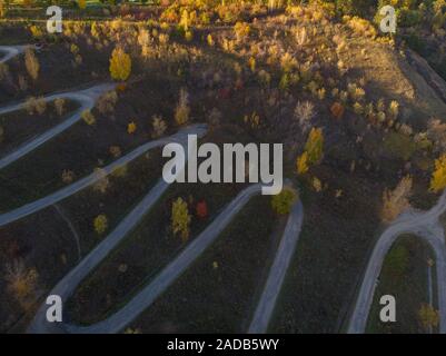 Aerial top vew of winding road in the city Stock Photo