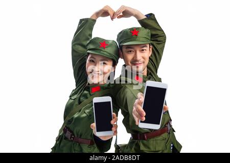 Young couples in military uniform Stock Photo
