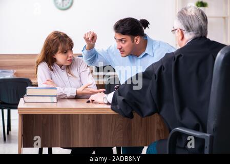 Young couple in the courthouse in divorce concept Stock Photo