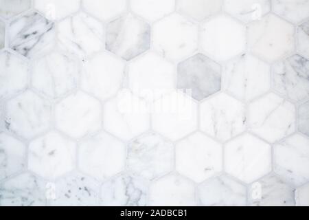 Marble hexagon tile floor background pattern with gray grout Stock Photo
