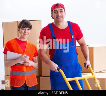 Professional movers doing home relocation Stock Photo