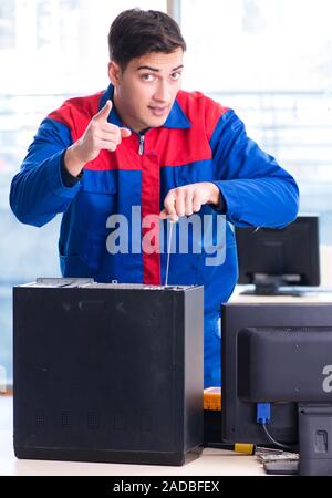 The computer repairman specialist repairing computer desktop Stock Photo