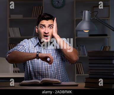 Student preparing for exams late at night Stock Photo