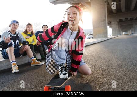 Young people skateboarding Stock Photo