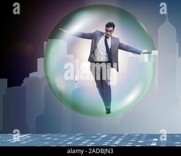 Businessman flying inside the bubble Stock Photo