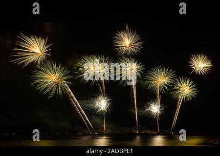 firework beautiful celebration festival colorful countdown merry christmas happy new year dark sky sparkle glowing cheerful anniversary Stock Photo