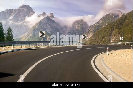 winding, asphalt road in the mountains Stock Photo