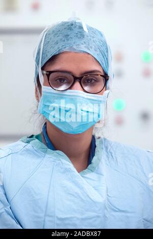 Surgeon in scrubs. Scrubs is the name given to the sanitary clothing worn by medical staff. Stock Photo