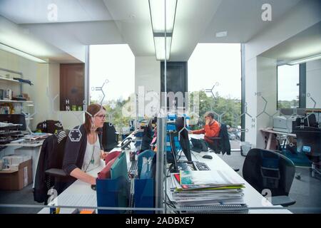 Proteomics research. Protein structures on a wall in a laboratory where researchers analyse and research the function and structure of proteins, a sci Stock Photo