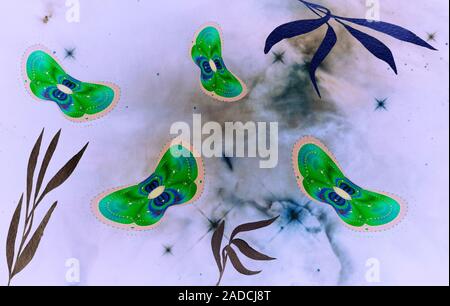 Abstract image of moths on a light background. Stock Photo