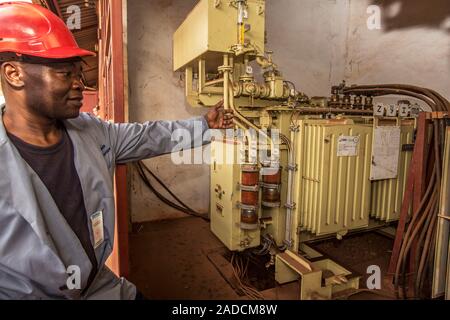 Heating engineer working on a hospital's heating systems. Photographed at St Mary's Hospital, Lacor, Gulu, Uganda. Stock Photo