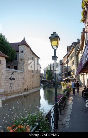 ANNECY, FRANCE - SEPTEMBER 13, 2019 : tourists enjoy historic atmosphere in downtown of Annecy, nicknamed the 'Pearl of French Alps'. Stock Photo