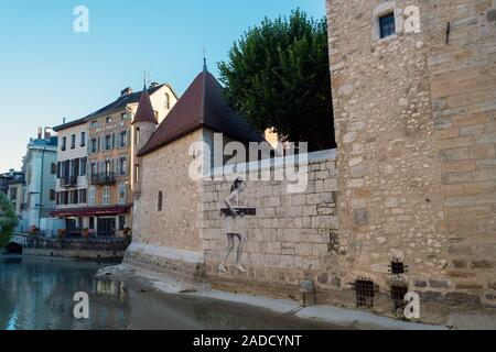 ANNECY, FRANCE - SEPTEMBER 13, 2019 : tourists enjoy historic atmosphere in downtown of Annecy, nicknamed the 'Pearl of French Alps'. Stock Photo