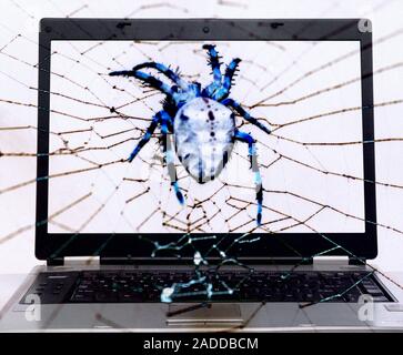 Computer virus. Conceptual image of a laptop computer enmeshed in a spider's web, representing the harmful effect of a computer virus. A computer viru Stock Photo