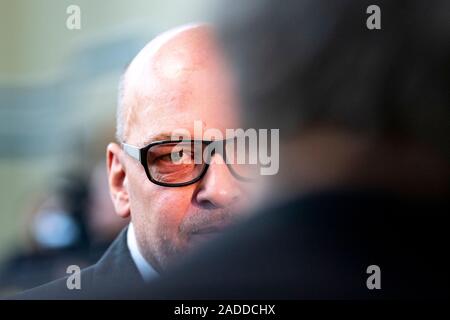 Detmold, Germany. 04th Dec, 2019. The defendant Rolf Herbrechtsmeier gives an interview. The public prosecutor's office in Detmold accuses the 'driving licence king' of 505 cases of fraud, which are said to have led to a total loss of almost 650,000 euros. Together with his wife he is said to have committed another 158 similar acts. Credit: David Inderlied/dpa/Alamy Live News Stock Photo