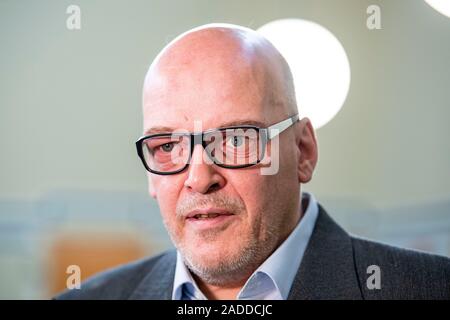 Detmold, Germany. 04th Dec, 2019. The defendant Rolf Herbrechtsmeier gives an interview. The public prosecutor's office in Detmold accuses the 'driving licence king' of 505 cases of fraud, which are said to have led to a total loss of almost 650,000 euros. Together with his wife he is said to have committed another 158 similar acts. Credit: David Inderlied/dpa/Alamy Live News Stock Photo