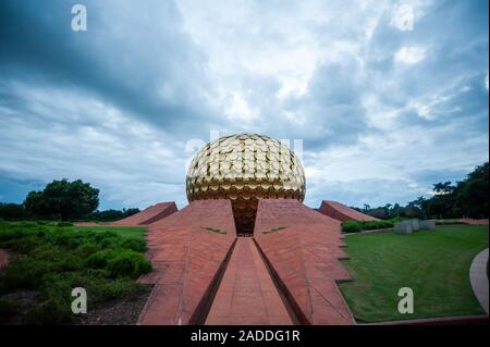 AUROVILLE, INDIA - December 2019: The Matrimandir and the Park of Unity. Stock Photo