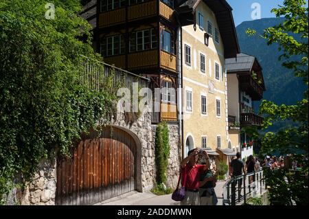 18.06.2019, Hallstatt, Upper Austria, Austria, Europe - Tourists stroll through the small town which is a popular Chinese travel destination. Stock Photo