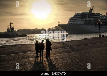 Evening atmosphere with cruise ship in Venice. Stock Photo
