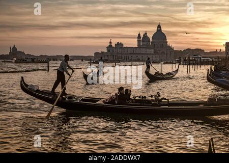 Evening atmosphere with gondolas in Venice. Stock Photo