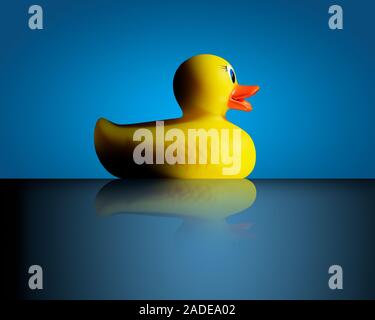 Yellow rubber duck against blue background. Stock Photo