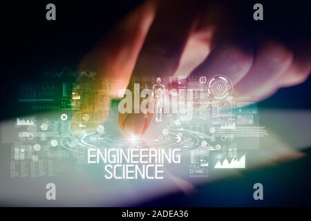 Finger touching tablet with web technology icons and ENGINEERING SCIENCE inscription Stock Photo