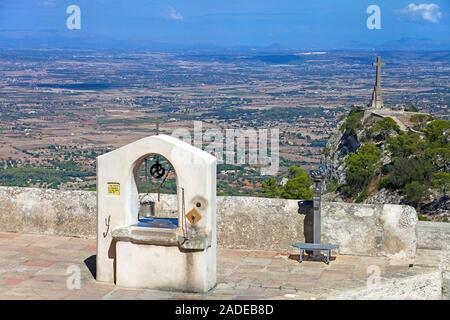 Draw well at Monastery Santuari de Sant Salvador on top of hill Puig de Sant Salvador, founded in 1342, Felanitx, Mallorca, Balearic islands, Spain Stock Photo