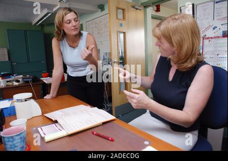 Women using sign language. Stock Photo