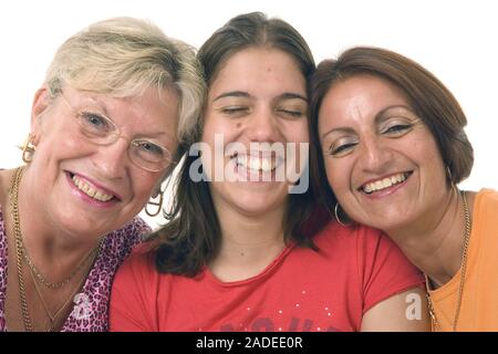 Three women, heads together, smiling. Stock Photo