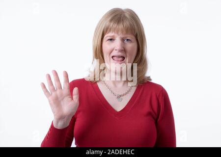 Woman with a hearing impairment using sign language. Stock Photo