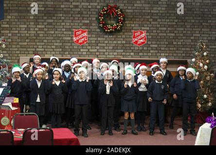 US First Lady Melania Trump (not pictured) listens to a school choir during a visit to the Salvation Army Clapton Centre in London. Stock Photo