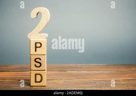 Wooden blocks with the word PSD 2 - Payment Services Directive. European Commission Banking Directive. Increase payment efficiency Stock Photo