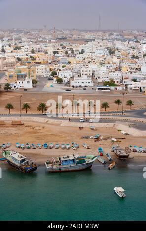 City view, dhow boats, dhow shipyard, Sur, Ash Sharqiyah province, Oman Stock Photo