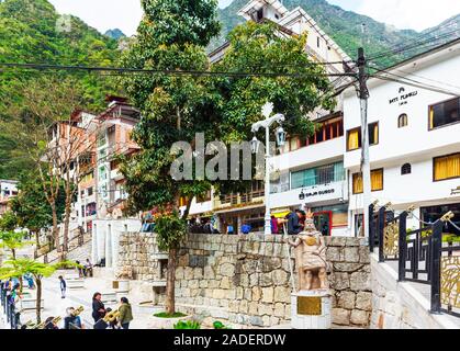 MACHU-PICCHU-PUEBLO, PERU - JUNE 7, 2019: View of the buildings and monument of the tourist village Stock Photo