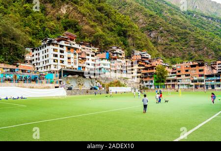 MACHU-PICCHU-PUEBLO, PERU - JUNE 7, 2019: Football field in a tourist village Stock Photo