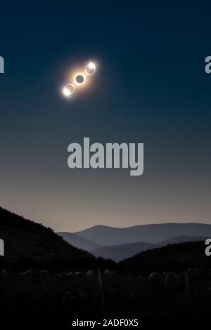 Solar eclipse. This composite image shows the diamond ring phenomenon positioned either side of an image of totality. The diamond ring phenomenon occu Stock Photo