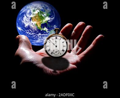 Earth with hand and stopwatch. Composite image illustrating the idea that time is running out for Earth. Stock Photo