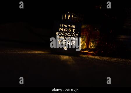 Christmas concept, decorations and ornaments. Lighting Christmas decoration with it is the most wonderful time of the year. Stock Photo