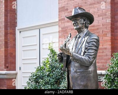 Statue of Bill Monroe with mandolin outside Ryman Auditorium. Bill Monroe is considered the founder of bluegrass music. Stock Photo