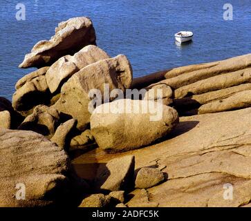 Granite rocks eroded by the sea at Tregastel, in northern Brittany, France. Stock Photo