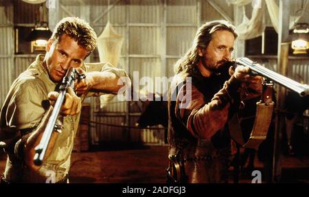 THE GHOST AND THE DARKNESS 1996 Paramount Pictures film with Michael Douglas at right and Val Kilmer Stock Photo