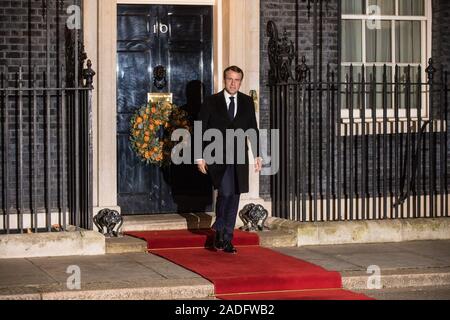 London, UK. 3 December, 2019. French President Emmanuel Macron leaves 10 Downing Street following a meeting with Turkish President Recep Tayyip Erdoğan hosted by Prime Minister Boris Johnson and German Chancellor Angela Merkel to discuss the ongoing dispute between the two Presidents following the Turkish invasion of Kurdish-controlled areas of northern Syria. Credit: Mark Kerrison/Alamy Live News Stock Photo