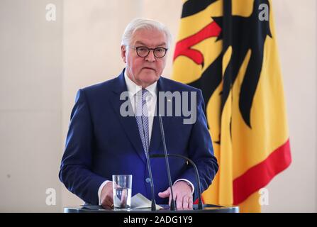 Berlin, Germany. 4th Dec, 2019. German President Frank-Walter Steinmeier delivers a speech during a ceremony for the Order of Merit of the Federal Republic of Germany at the Bellevue Palace in Berlin, capital of Germany, on Dec. 4, 2019. Credit: Shan Yuqi/Xinhua/Alamy Live News Stock Photo