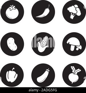 Vegetables icons set. Tomato, hot chili pepper, broccoli, potato, corn, mushrooms, beetroot, paprika, eggplant, maize, turnip. Vector white silhouette Stock Vector